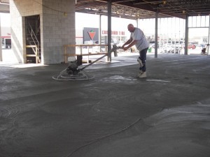 Spreading the concrete for main floor
