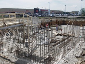 Concrete guys pour South/West basement walls